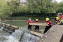 Malmesbury Fire Station volunteers fixing the weir