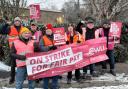 Striking posties in Chipping Norton brave the cold to make their voices heard