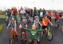 Hannah Escott, CEO of Open Trail Cycle Coaching and Forest School, and excited cyclists at the opening of Evesham VeloPark.