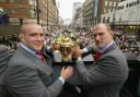 Phil Vickery (left) and Lawrence Dallaglio (right) pictured with the Webb Ellis Cup after their Rugby World Cup victory