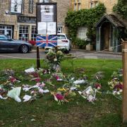 Flowers laid at Stocks Green in Stow. Credit: Stow on the Wold Town Council