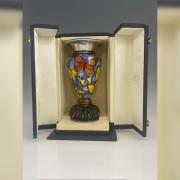 Fred Rich's silver and enamel butterfly vase fetched £17,420, a record for one of the goldmith's vases
