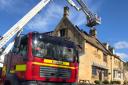 Fire crews at The Churchill Arms. Photo: @Glosfire
