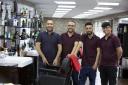 Pictured from right are Ali Senkoy, Mustafa Aksahin and his brothers Ismail and Mehmet Aksahin at the new Turkish Barbers in Witney when it opened in 2016