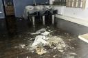 Firefighters had to remove the ceiling after a water leak flooded the salon