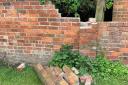 A wall damaged by youths in Shipston