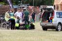 Cotswold Show stewards and first aid team helping the rider after the accident