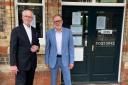From left, Councillors Angus Jenkinson and Paul Hodgkinson outside Moreton ticket office.CREDIT: Liberal Democrats