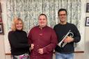 Alex Bland (centre) is Shipston Town Band's new musical director