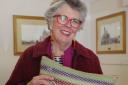 During her visit to Moreton Country Market, Prue Leith received a cushion embroidered by local resident Daphne Carss