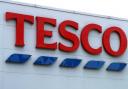 A councillor is calling for Tesco to introduce a way to donate to foodbanks when shopping online