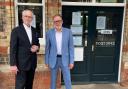 From left, Councillors Angus Jenkinson and Paul Hodgkinson outside Moreton ticket office.CREDIT: Liberal Democrats