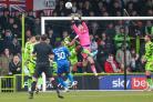 Forest Green Rovers goalkeeper Luke McGee(1) pushes thew ball clear during the EFL Sky Bet League 2 match between Forest Green Rovers and Carlisle United at the The Fully Charged New Lawn, Forest Green, United Kingdom on 22 January 2022.
