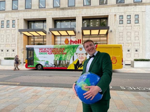 Cotswold Journal: Joe Lycett outside of Shell's Headquarters in London, perfoming a stunt as part of his documentary Joe Lycett vs The Oil Giant, which explores the energy company, its marketing and its exploration for new oil reserves. Photo via PA.
