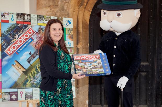 Cotswold Journal: Cotswold Journal editor Stephanie Preece meets Mr Monopoly at the launch of Monopoly: Cotswolds Edition