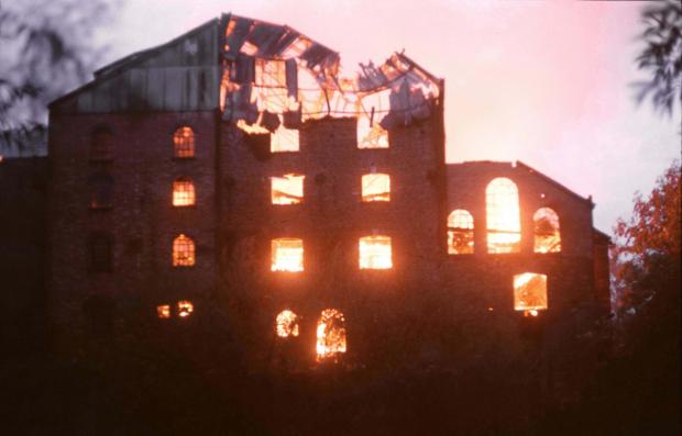 Cotswold Journal: Pershore Mill on fire and destroyed in the summer of 1976. Picture: Michael Clemens