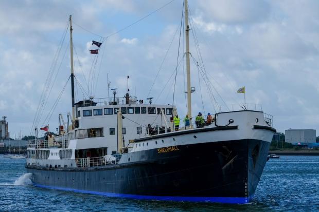 Shieldhall approaching her berth in Southampton with her new electric-blue hull