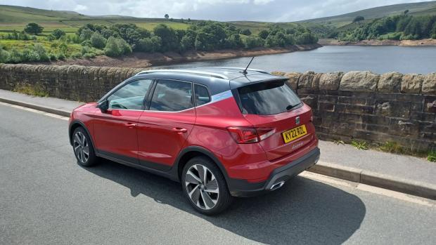 Cotswold Journal: The SEAT Arona on test in West Yorkshire, pictured next to Digley Reservoir in Kirklees (left) and near Castle Hill, Huddersfield (top left)