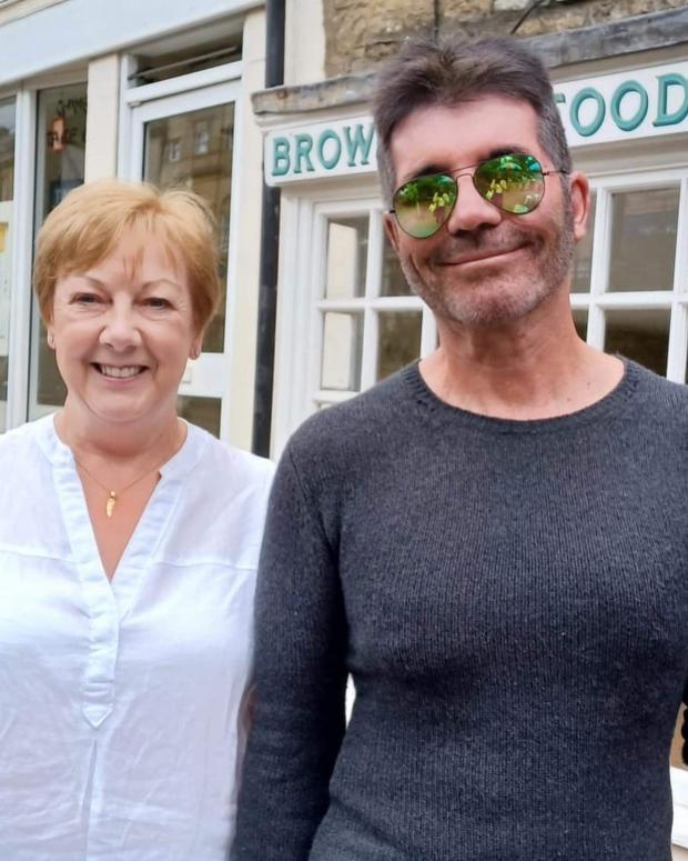 Cotswold Journal: Simon Cowell with Tickittyboo employee Susan Forde