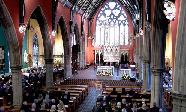 Cotswold Journal: The inside of St Mary's for Dermott's funeral. Picture: YOUTUBE