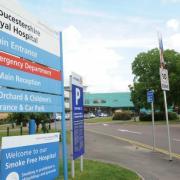 More than £1.4m was paid in car parking fees by people visiting Gloucestershire hospitals last year