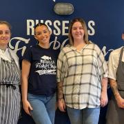 The team at Russell's Fish and Chips as they reopen on Friday - Gabi Luck, Summah Hope, Emily Draper, and Dale Blake
