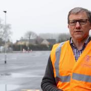 Councillor Mike Evemy at the Rissington Road car park