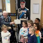 Cyril John Holt with children from St Hugh of Lincoln Nursery as part of his birthday celebrations