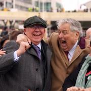 Sir Alex Ferguson, owner of Monmiral, celebrates winning the Pertemps Network Final, which was ridden to victory by Harry Cobden on day three of the 2024 Cheltenham Festival at Cheltenham Racecourse.