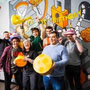 Escape Rooms Cheltenham and Eat Sleep Axe celebrate 5 years in Winchcombe Street, offering unique escape games, axe-throwing, and community events.