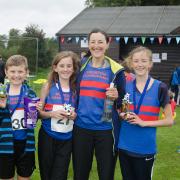 LEADING THE WAY: The Dee family celebrate success for Bourton Roadrunners