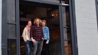 Sally, Bob and Sue standing in the entrance of the new Sue Parkinson homeware store in Love Lane Industrial Estate