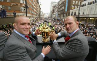 Phil Vickery (left) and Lawrence Dallaglio (right) pictured with the Webb Ellis Cup after their Rugby World Cup victory